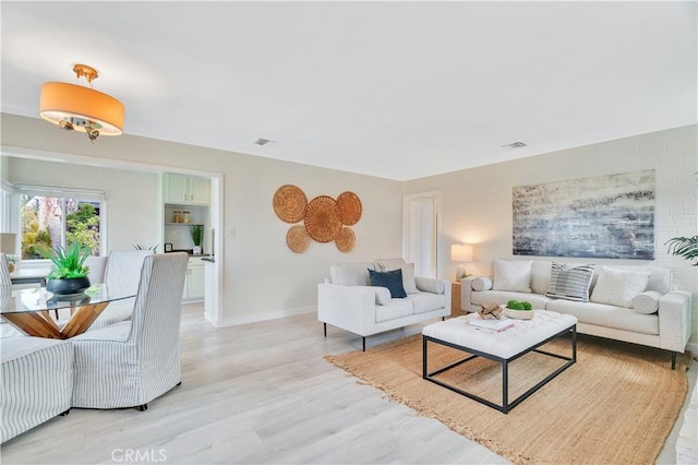 524 N Paulina Ave, Redondo Beach, CA 90277 - living room with light wood finished floors and baseboards
