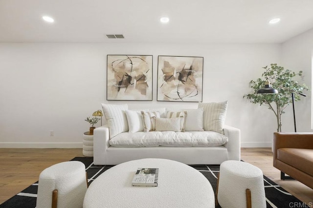 1744 Round Tree Dr, Oceanside, CA 92056 - living area with light wood-style flooring, recessed lighting, and baseboards