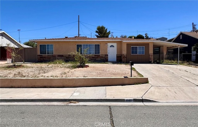 640 Flora St, Barstow, CA 92311 - ranch-style home with stone siding, stucco siding, and driveway