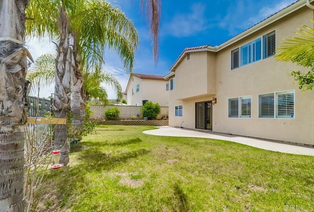 475 Marsh Harbor Dr, San Diego, CA 92154 - back of property with stucco siding and a patio