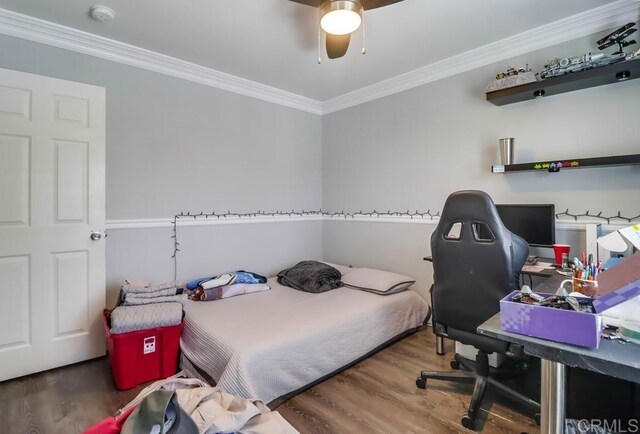 475 Marsh Harbor Dr, San Diego, CA 92154 - bedroom with wood finished floors, crown molding, a desk, and a ceiling fan