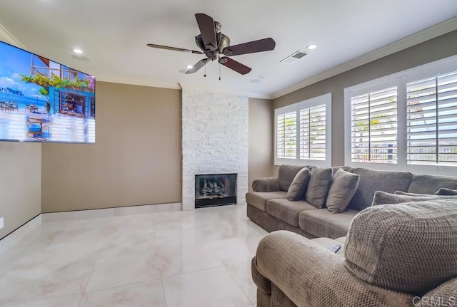 475 Marsh Harbor Dr, San Diego, CA 92154 - tiled living area with a ceiling fan, crown molding, a stone fireplace, and recessed lighting