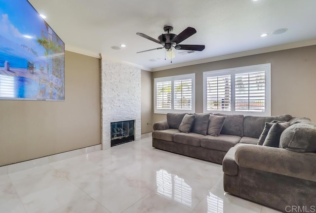 475 Marsh Harbor Dr, San Diego, CA 92154 - living area with crown molding, a ceiling fan, a stone fireplace, recessed lighting, and tile patterned flooring