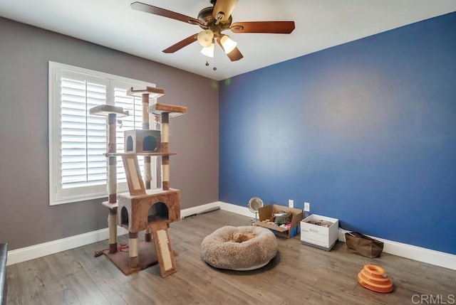 475 Marsh Harbor Dr, San Diego, CA 92154 - misc room featuring a ceiling fan, wood finished floors, and baseboards