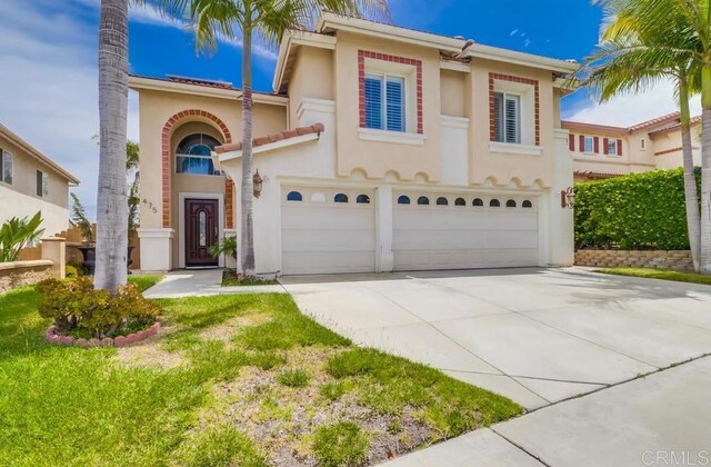 475 Marsh Harbor Dr, San Diego, CA 92154 - mediterranean / spanish-style house with a garage, concrete driveway, and stucco siding