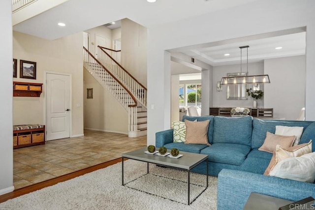6628 Sitio Sago, Carlsbad, CA 92011 - living room featuring stairway, recessed lighting, baseboards, and a chandelier