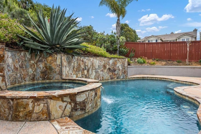 6628 Sitio Sago, Carlsbad, CA 92011 - view of swimming pool with fence and a pool with connected hot tub