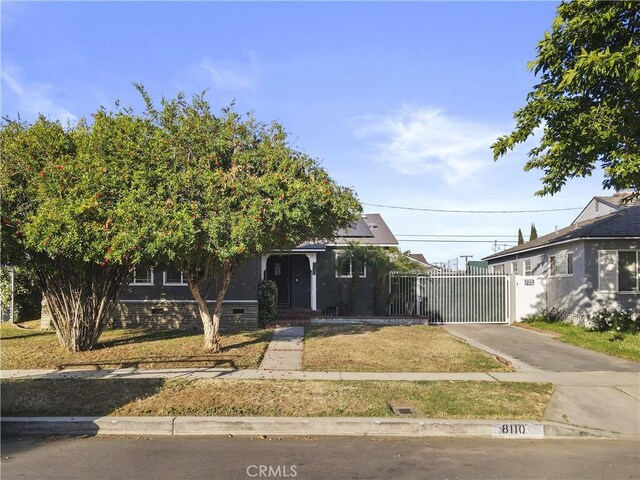 8110 Lesner Ave, Lake Balboa, CA 91406 - view of front of house with a gate and driveway