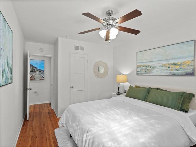 8110 Lesner Ave, Lake Balboa, CA 91406 - bedroom featuring wood finished floors and a ceiling fan