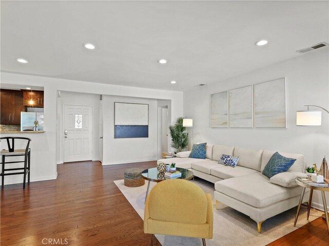8110 Lesner Ave, Lake Balboa, CA 91406 - living area featuring dark wood-style floors and recessed lighting
