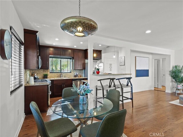 8110 Lesner Ave, Lake Balboa, CA 91406 - dining area featuring dark wood-style flooring and recessed lighting