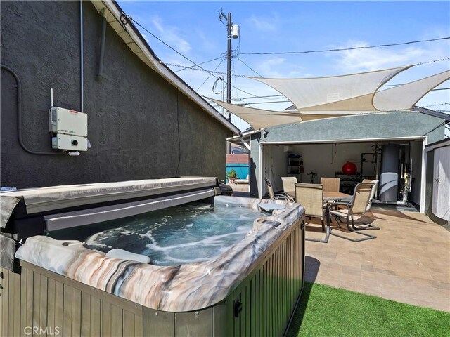 8110 Lesner Ave, Lake Balboa, CA 91406 - view of patio / terrace featuring a hot tub and outdoor dining space