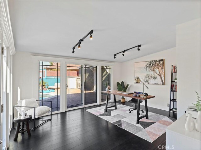 8110 Lesner Ave, Lake Balboa, CA 91406 - home office with rail lighting, wood finished floors, and plenty of natural light