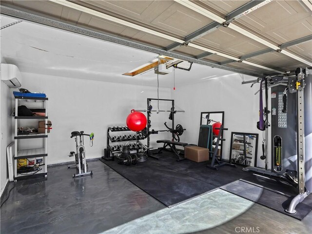 8110 Lesner Ave, Lake Balboa, CA 91406 - exercise room featuring a wall unit AC and a garage
