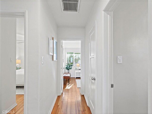 8110 Lesner Ave, Lake Balboa, CA 91406 - corridor featuring light wood-style floors and baseboards