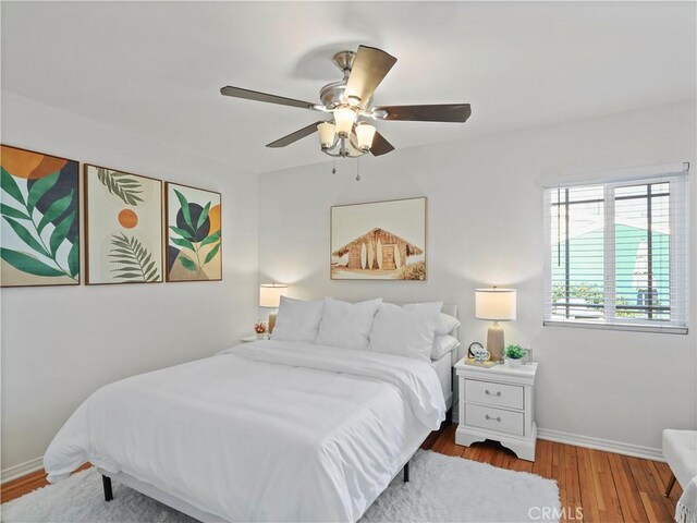 8110 Lesner Ave, Lake Balboa, CA 91406 - bedroom featuring wood finished floors and ceiling fan