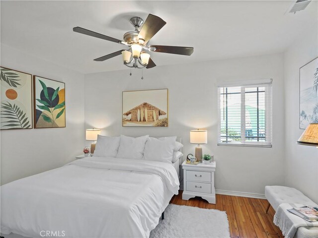 8110 Lesner Ave, Lake Balboa, CA 91406 - bedroom featuring wood finished floors and ceiling fan