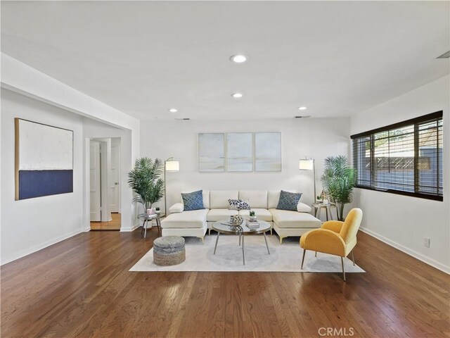 8110 Lesner Ave, Lake Balboa, CA 91406 - living area featuring wood finished floors and recessed lighting