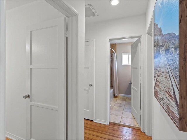 8110 Lesner Ave, Lake Balboa, CA 91406 - corridor with light wood-style floors and recessed lighting