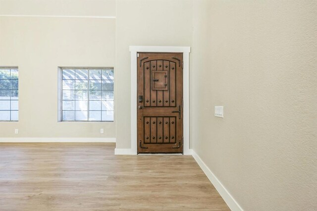 40550 Ventana Ct, Palm Desert, CA 92260 - entryway featuring light wood-style floors and baseboards