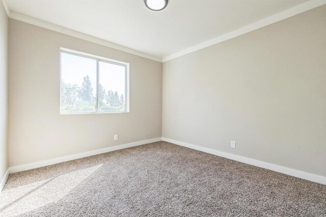 40550 Ventana Ct, Palm Desert, CA 92260 - spare room with carpet, crown molding, and baseboards
