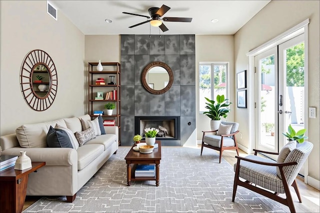 40550 Ventana Ct, Palm Desert, CA 92260 - living area featuring a ceiling fan and a tile fireplace