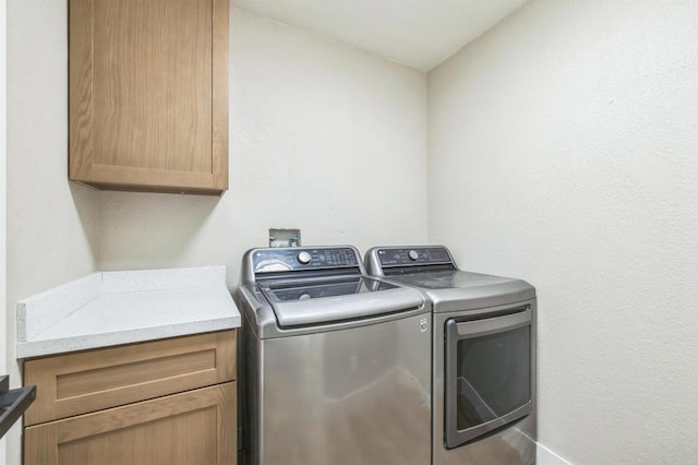 40550 Ventana Ct, Palm Desert, CA 92260 - laundry room with washing machine and dryer and cabinet space