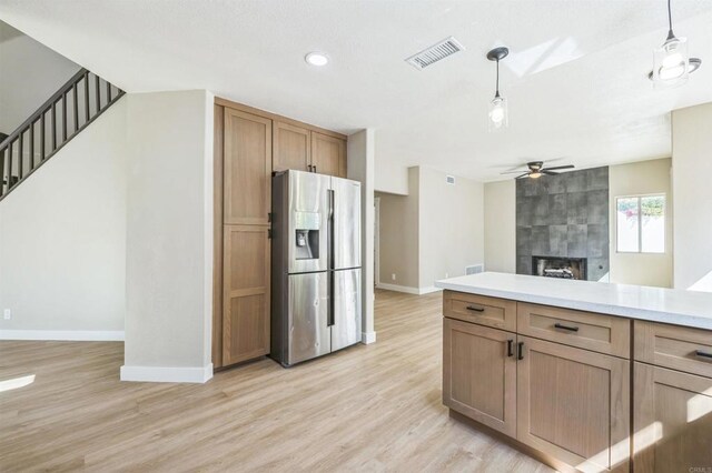 40550 Ventana Ct, Palm Desert, CA 92260 - kitchen with stainless steel refrigerator with ice dispenser, a ceiling fan, baseboards, light wood finished floors, and recessed lighting