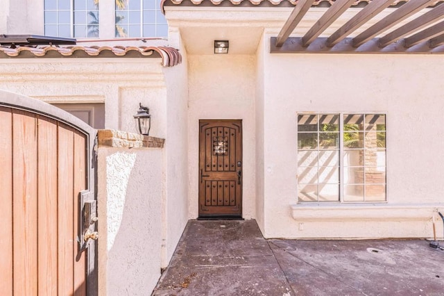 40550 Ventana Ct, Palm Desert, CA 92260 - view of exterior entry featuring a gate and stucco siding