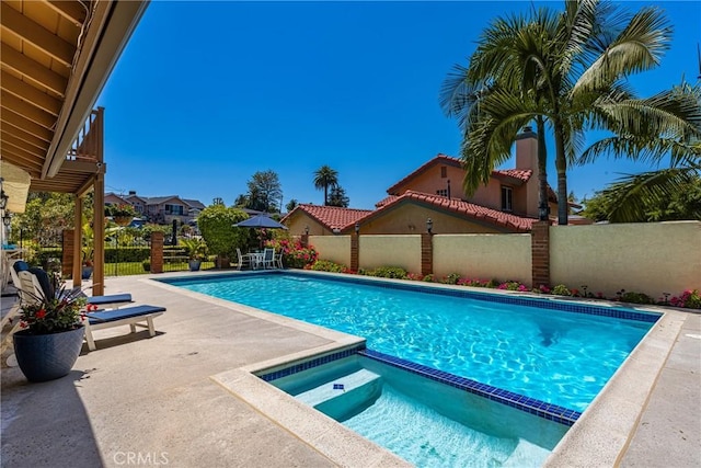 15541 Olive Branch Dr, La Mirada, CA 90638 - view of pool with a fenced backyard, a patio area, and a pool with connected hot tub
