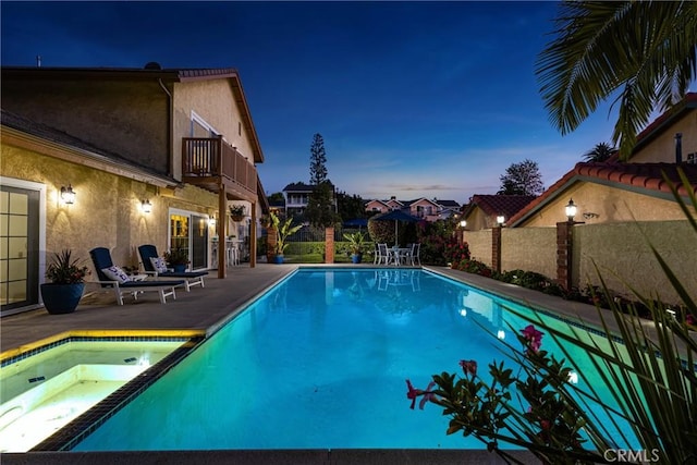 15541 Olive Branch Dr, La Mirada, CA 90638 - pool at dusk with a patio and a pool with connected hot tub