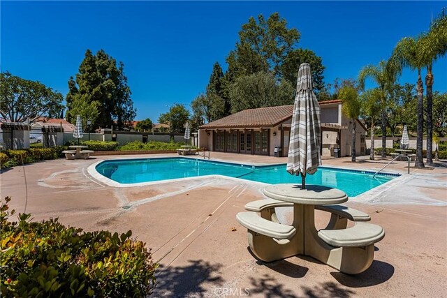 15541 Olive Branch Dr, La Mirada, CA 90638 - community pool featuring a patio area