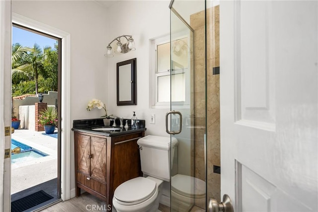15541 Olive Branch Dr, La Mirada, CA 90638 - full bathroom with vanity, a shower stall, and toilet
