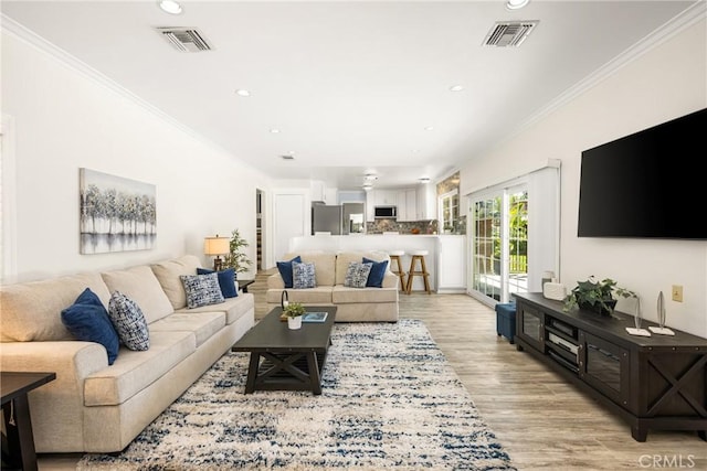 15541 Olive Branch Dr, La Mirada, CA 90638 - living area featuring ornamental molding, recessed lighting, and light wood-style flooring