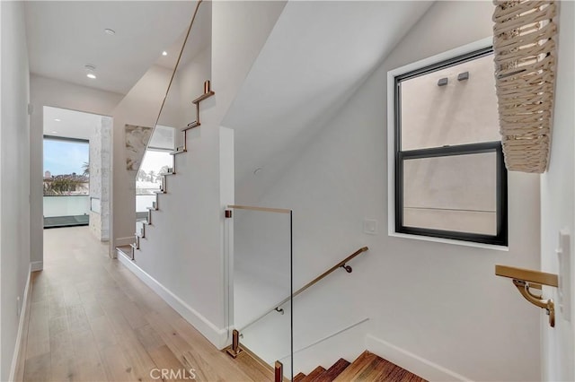 518 8th St, Huntington Beach, CA 92648 - staircase with wood finished floors and baseboards