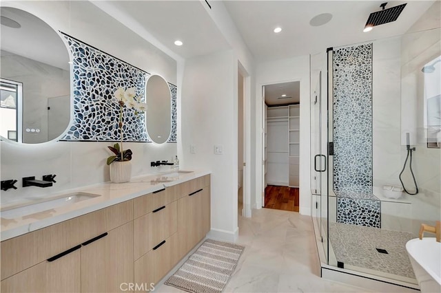518 8th St, Huntington Beach, CA 92648 - bathroom with a shower stall, double vanity, recessed lighting, marble finish flooring, and a walk in closet