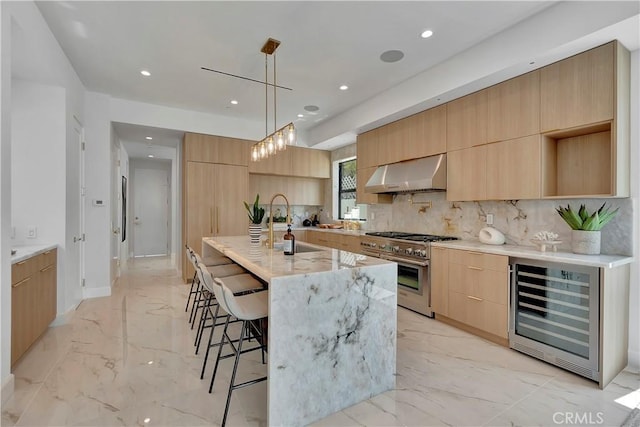 518 8th St, Huntington Beach, CA 92648 - kitchen with stainless steel stove, wine cooler, modern cabinets, extractor fan, and light brown cabinets