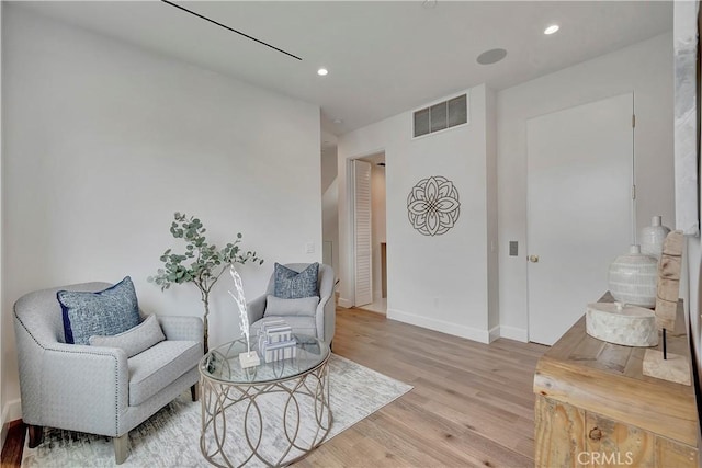 518 8th St, Huntington Beach, CA 92648 - sitting room with light wood-style flooring, baseboards, and recessed lighting