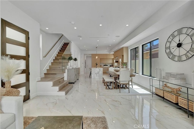 518 8th St, Huntington Beach, CA 92648 - entryway with light marble finish floors, stairs, recessed lighting, and baseboards