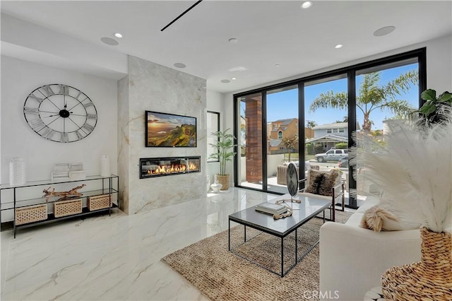 518 8th St, Huntington Beach, CA 92648 - living room with a fireplace, marble tiled floors, and recessed lighting
