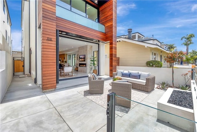 518 8th St, Huntington Beach, CA 92648 - view of patio / terrace with an outdoor living space, a balcony, and fence
