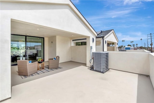518 8th St, Huntington Beach, CA 92648 - view of patio featuring central AC