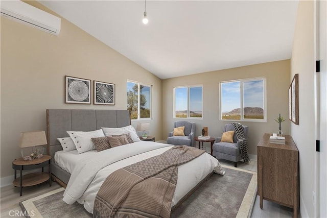 1809 Delgada Ave, Landers, CA 92285 - bedroom featuring a wall mounted air conditioner, multiple windows, vaulted ceiling, light wood finished floors, and baseboards