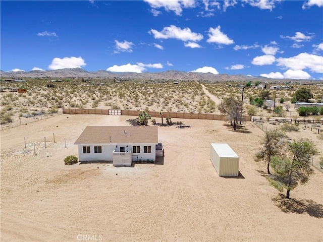 1809 Delgada Ave, Landers, CA 92285 - aerial view of sparsely populated area with a desert landscape and a mountain backdrop