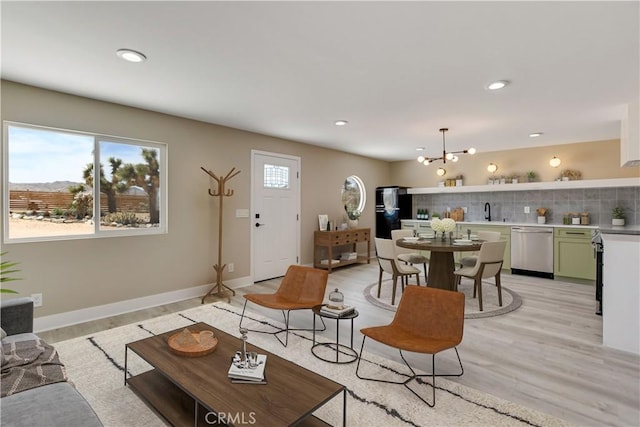 1809 Delgada Ave, Landers, CA 92285 - living area with recessed lighting, light wood-style flooring, baseboards, and a chandelier