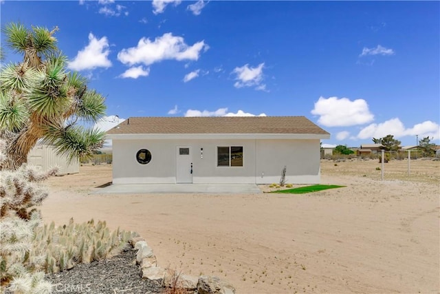 1809 Delgada Ave, Landers, CA 92285 - rear view of property with stucco siding
