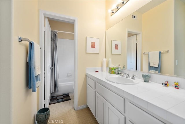 11803 Sortino Ct, Moorpark, CA 93021 - bathroom featuring vanity and shower / bath combo with shower curtain