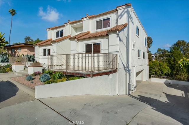 251 Avenida Madrid, San Clemente, CA 92672 - view of front facade with stucco siding, a garage, and a tile roof