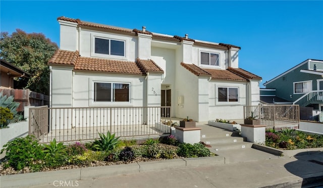 251 Avenida Madrid, San Clemente, CA 92672 - mediterranean / spanish-style house featuring a tiled roof, stucco siding, and covered porch