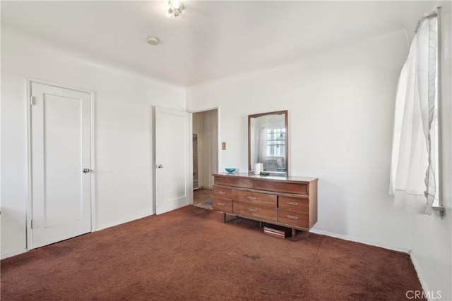 1845 W 91st Pl, Los Angeles, CA 90047 - bedroom featuring dark colored carpet and baseboards